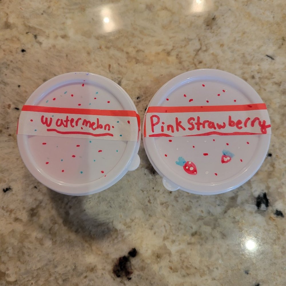 Homemade glitter strawberry and watermelon slime pre made